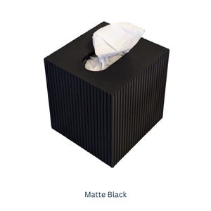 May include: Matte black tissue box cover with a ribbed design.