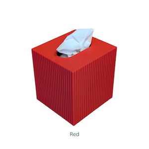 May include: Red square tissue box with a white tissue inside.