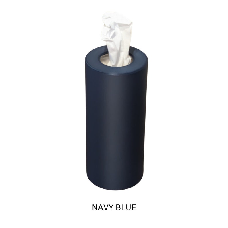 May include: A navy blue tissue box dispenser with a white tissue peeking out of the top.