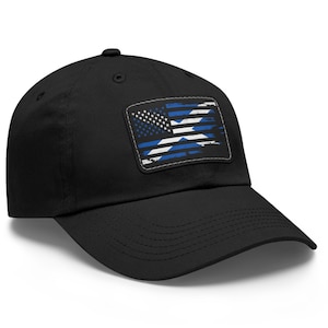 May include: A black baseball cap with a distressed American flag patch featuring a blue and white Scottish Saltire cross.