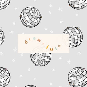 May include: A seamless pattern featuring silver disco balls with white stars on a light gray background. The text "drew julie" is written in a colorful arc across the center of the pattern.