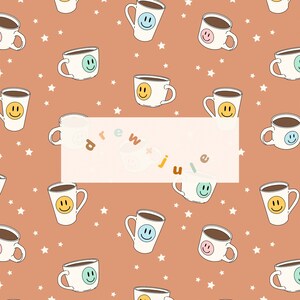 May include: A seamless pattern featuring various colored mugs with smiley faces on a light brown background with white stars. The text "drew juice" is written in a white box in the center of the pattern.