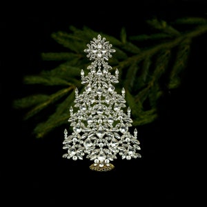 An intricate table top Xmas tree, handcrafted with Clear coloured Czech rhinestone crystals with Christmas decorations.