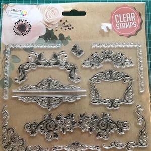 Clear stamps with borders, corners, flowers.