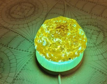 Golden night light handmade from resin