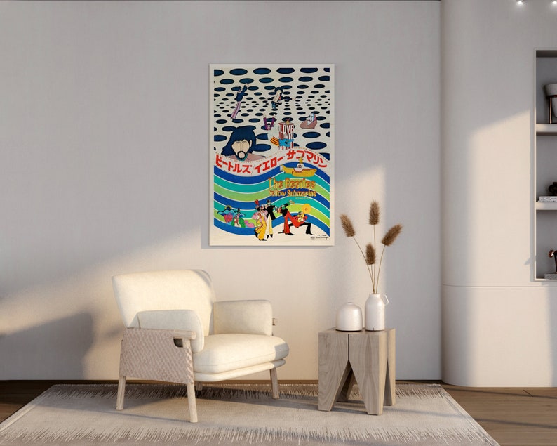 a room with a white chair and a poster on the wall