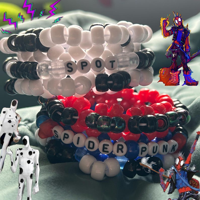 May include: Two handmade beaded bracelets. One bracelet is white, black, and clear beads spelling "SPOT". The other bracelet is red, black, blue, and white beads spelling "SPIDER PUNK". The bracelets are stacked on top of each other.