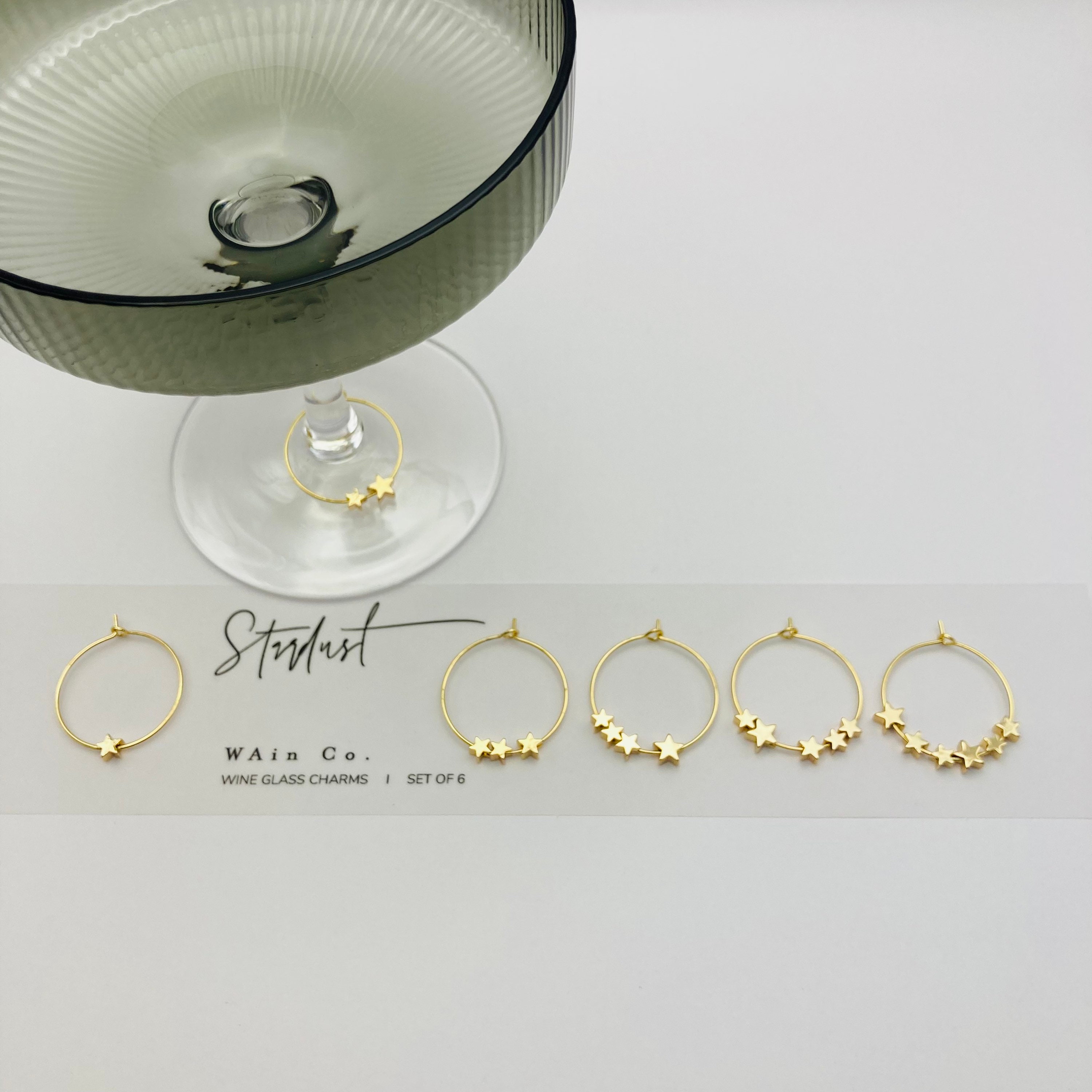 6 Gold Tone and Gold Stardust Christmas Wine Glass Charms in Gift Box 