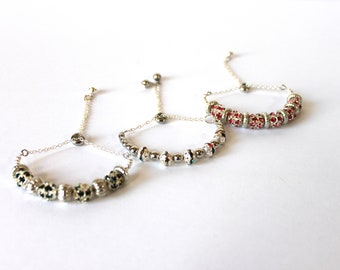 Stainless steel and Crystal adjustable bracelet - Available in various colors. Elegant and Pretty for any occasion.