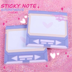 May include: Two purple and white sticky notes shaped like a retro cassette tape with a heart on the screen. The sticky notes are on a pink glitter background. The text "Soundwave" and "(1.72CM)" is printed on the top sticky note.