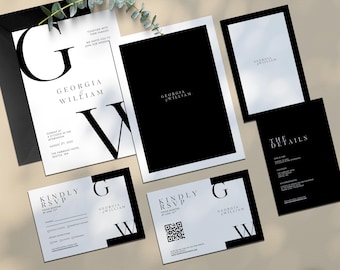 May include: A collection of black and white wedding stationery, including invitations, RSVP cards, and detail cards. The design features the names "Georgia William" in elegant typography. The stationery is arranged on a neutral surface with a sprig of greenery.