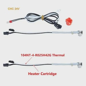 May include: An overhead shot shows two heater cartridges with black and white wires, connectors, and a red component. The text "CHC 24V" and "104NT-4-R025H42G Thermal" are visible. The words "Heater Cartridge" are also present.