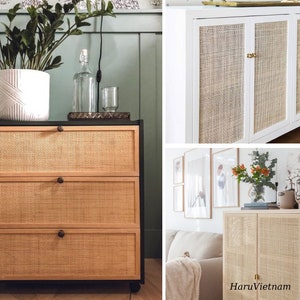 May include: Three different pieces of furniture with woven cane drawer fronts and cabinet doors. The furniture is painted white and black. The cane is a natural light brown color.