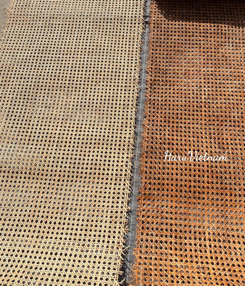 May include: Close-up of two sections of woven cane webbing. One section is a light beige color, and the other is a warm brown. The webbing has a repeating pattern of small, evenly spaced holes. The text "Haru Vietnam" is visible in the lower right corner.
