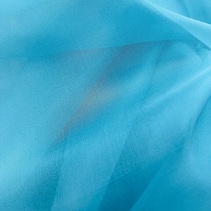 sea blue  100% silk organza mulberry style exclusive  fabrics for dress jacket shirt  skirt lamp shape and much more use made in Italy