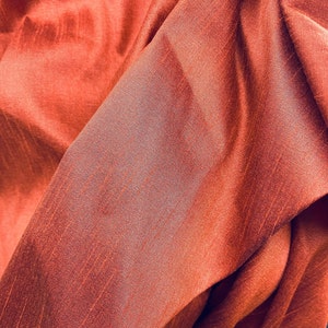 Orange black polyester shantung fabrics made for dresses and curtains