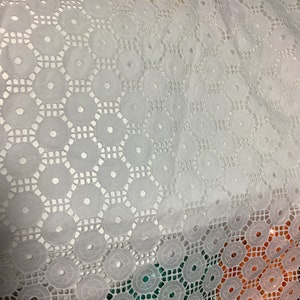 100% cotton eyelet embroidery made in France great for summer dress table tops skirt pants shirt and much more