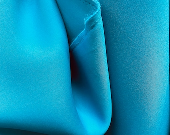 Teal blue neoprene scuba fabrics great for dress jacket pants skirt and much more use