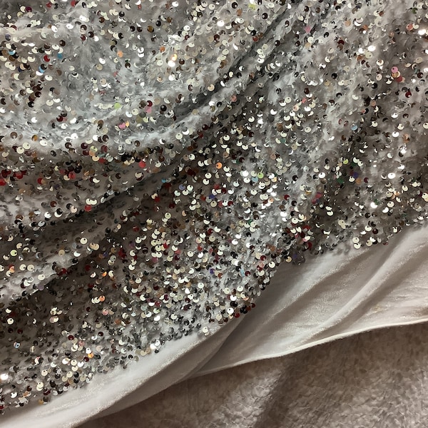 White velvet with silver sequins 4way stretch made in Spain great fabric for dress jacket skirt shoes and much more