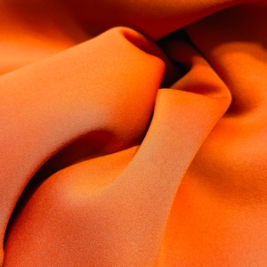Orange stretch mikado fabrics great for dress jacket pants skirt suit and much more made in Italy