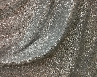 Silver sequins all over great fabrics for dress jacket skirt pants shirt and much more made in Spain