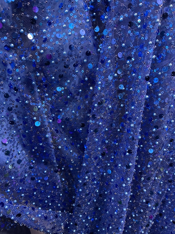 Royal blue  heavy beaded and pores  shinny sequins on mesh  made in Spain