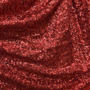 Red sequins all over great fabrics for dress jacket skirt pants shirt and much more made in Spain