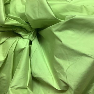 Lime green silk taffeta shinny great fabrics for dress jacket pants skirt shirt and much more made in England