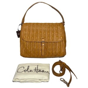 Cole Haan Jenna - Bolso de mano acolchado de piel auténtica en marrón mostaza, tipo bandolera, con asa superior, color camello y marrón Academia clásica