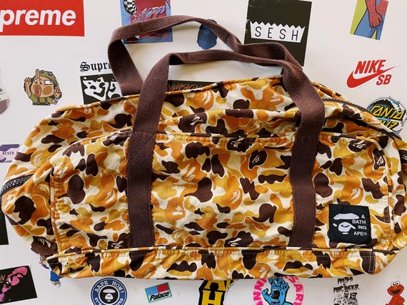 【A・BATHING APE】ABC CAMO BOSTON BAG BAPE® LADIES'】 MULTI CAMO BOSTON BAG 2025年7月12日(土)発売