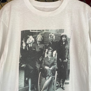 Camiseta promocional con póster de los Rolling Stones de los años 70 y 80