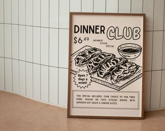 May include: A framed black and white illustration advertising a "Dinner Club" Japanese gyoza special. The poster features a drawing of gyoza, a bowl of sauce, and text that reads "Open 7 days a week!" and "Your choice of pan fried pork, veggie or tofu gyozas."