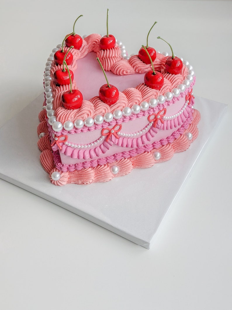 Heart fake cake with pearls and cherries image 5