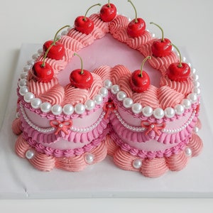 Heart fake cake with pearls and cherries image 3