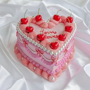 Heart fake cake with pearls and cherries