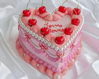 Heart fake cake with pearls and cherries