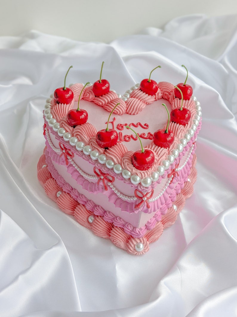 Heart fake cake with pearls and cherries image 1