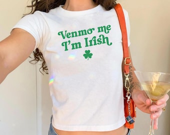 May include: White cropped t-shirt with the text "Venmo me I'm Irish" in green letters and a green shamrock.