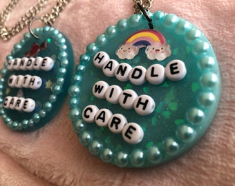 HANDLE WITH CARE resin necklace