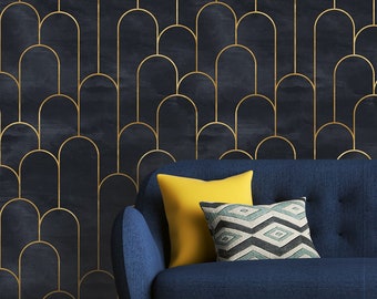 May include: A navy blue sofa with a yellow and gray patterned pillow. The sofa is in front of a wall with a gold and black geometric pattern.