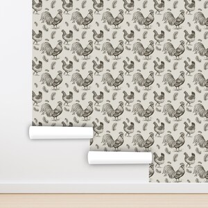 May include: A seamless pattern wallpaper featuring a repeating design of black and white roosters and feathers on a light beige background.
