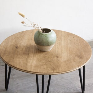 Minimalist low coffee table Living room table in minimal style oak and iron wood