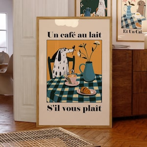 May include: A vintage-style illustration of a dog sitting at a table with a cup of coffee and a croissant. The text on the poster reads "Un café au lait" and "S'il vous plaît".