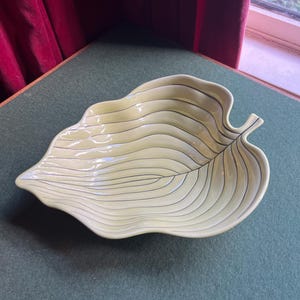 Vintage Carlton Ware console serving dish. Leaf shaped lilac green glaze with gold hand painted detail. Decorative fruit bowl.