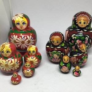 Matryoshka nesting dolls with 4 smaller dolls. Beautifully detailed floral designs. 1 available. Russian folk art collectors&#39; gift. Red doll