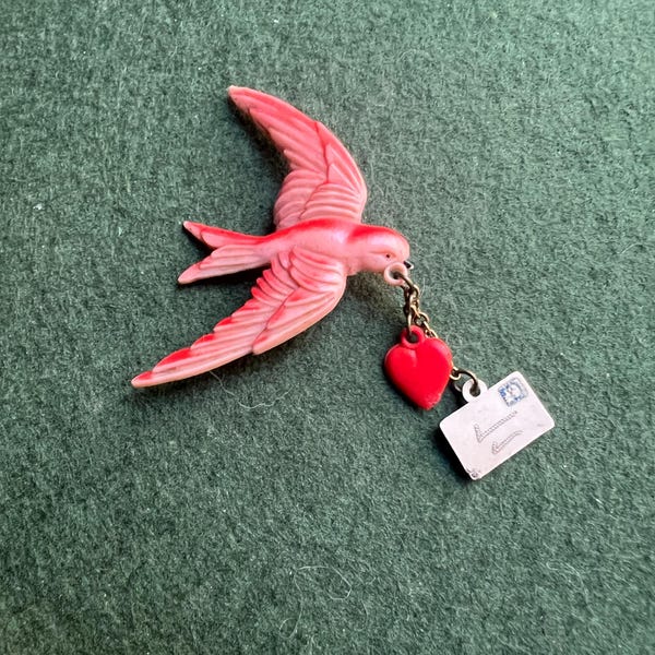 Vintage celluloid swallow bird brooch. Red bird with heart and envelope. Jewellery lover gift.