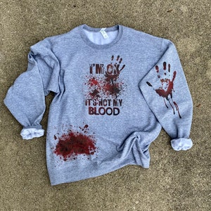 I’m ok, it’s not my blood, blood splattered hand print true crime sweatshirt