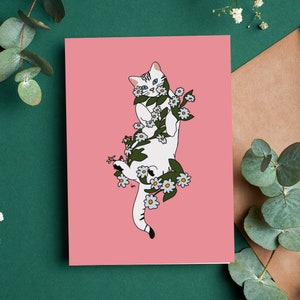 Cat tangled in daisies — greeting card