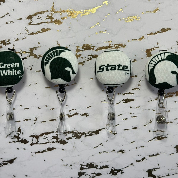 Michigan State University Badge Reel Buttons. MSU Spartans Badge Buttons. Nurse Badge Buttons. Customizable and Interchangeable.