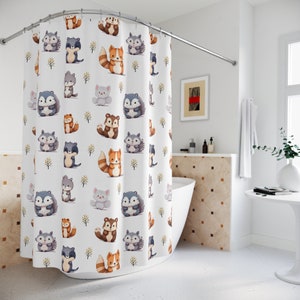 May include: White shower curtain with a repeating pattern of cartoon woodland animals, including raccoons, squirrels, foxes, and owls. The animals are all in different poses and have different expressions. The background is white with small yellow flowers and green leaves.